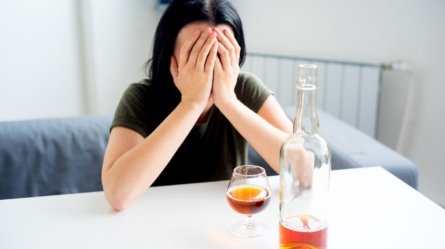 A young woman suffering from alcohol addiction.