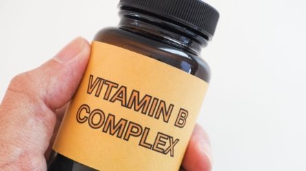 A bottle of Vitamin B Complex supplements.