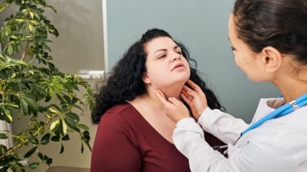 A woman is being examined for Hypothyroidism.